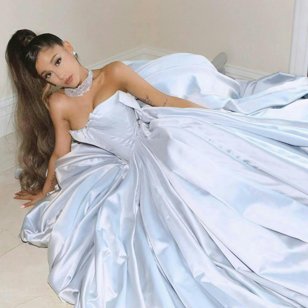 Ariana Grande in a light blue gown.