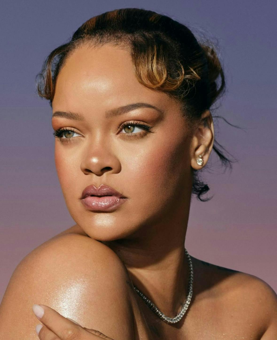 Rihanna poses against a purple backdrop for Fenty Beauty. Courtesy of Fenty Beauty.