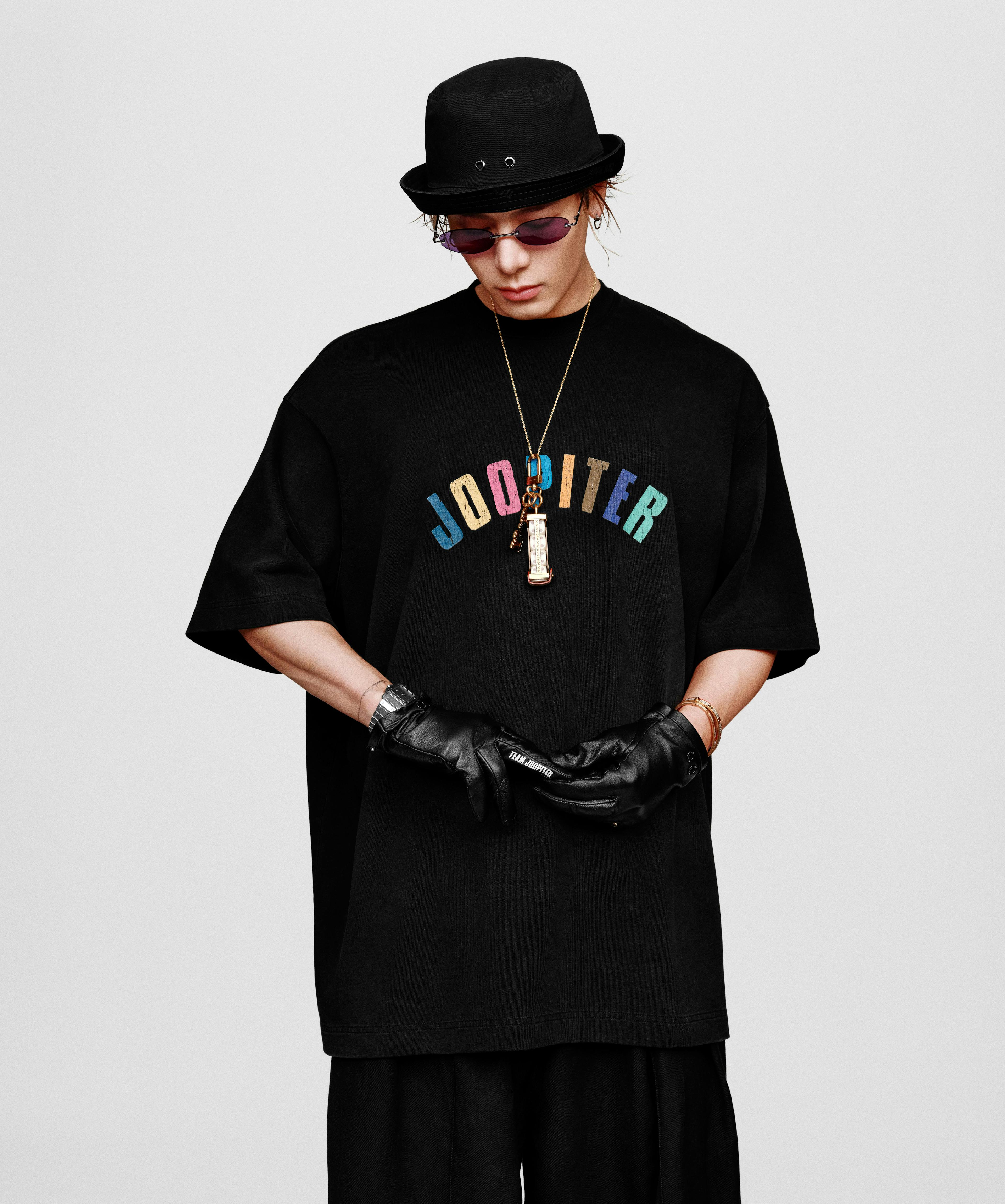 Jackson Wang in exclusive Joopiter merch, a black t-shirt with colored letters spelling out "Joopiter." Courtesy of Joopiter.