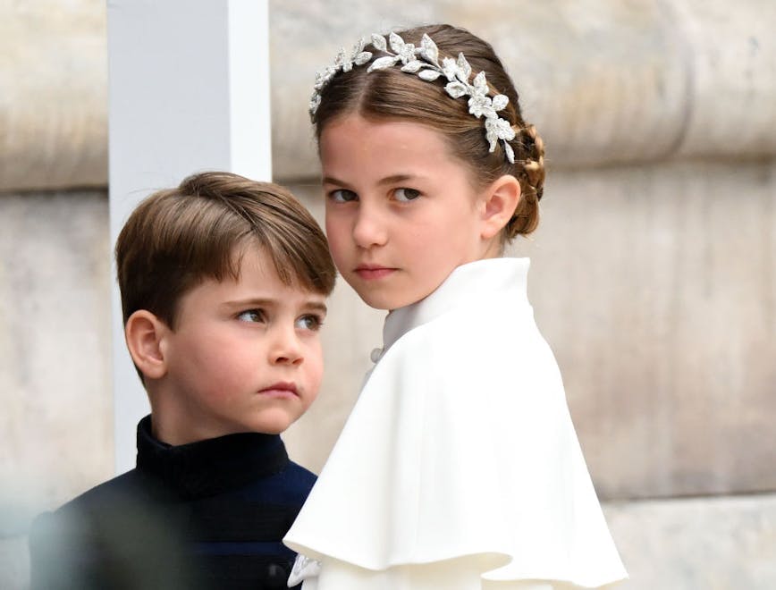 Princess Charlotte dresses : princess charlotte style : Prince Louis and Princess Charlotte arrive at Westminster Abbey for the Coronation of King Charles III and Queen Camilla. Getty Images.