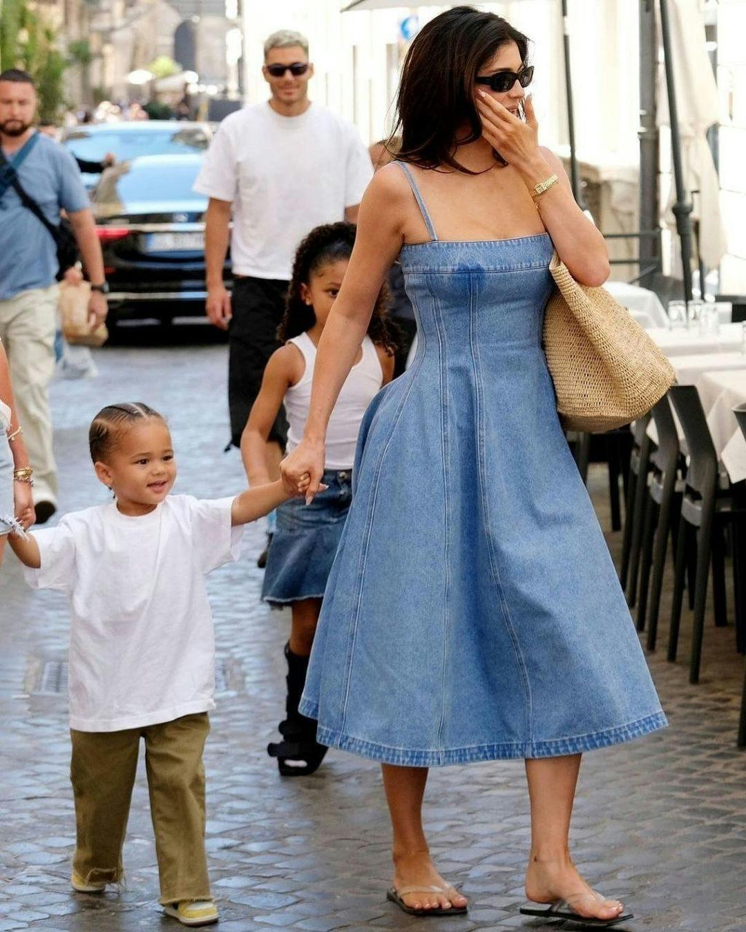 Kylie Jenner in a denim Marni dress in Italy.