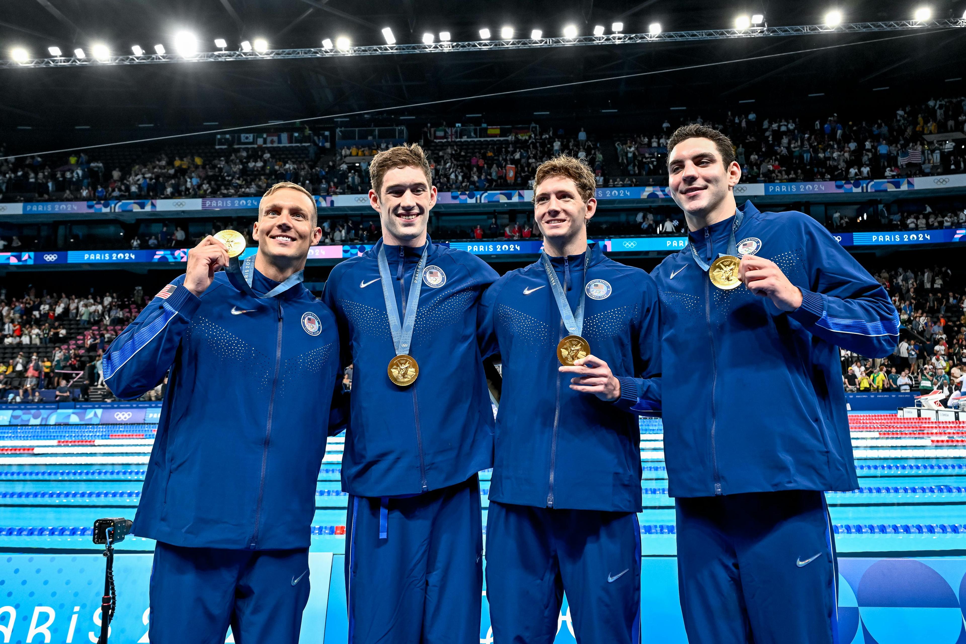 Team USA's 4x100 Men's Relay team showing off their gold medals. Getty.