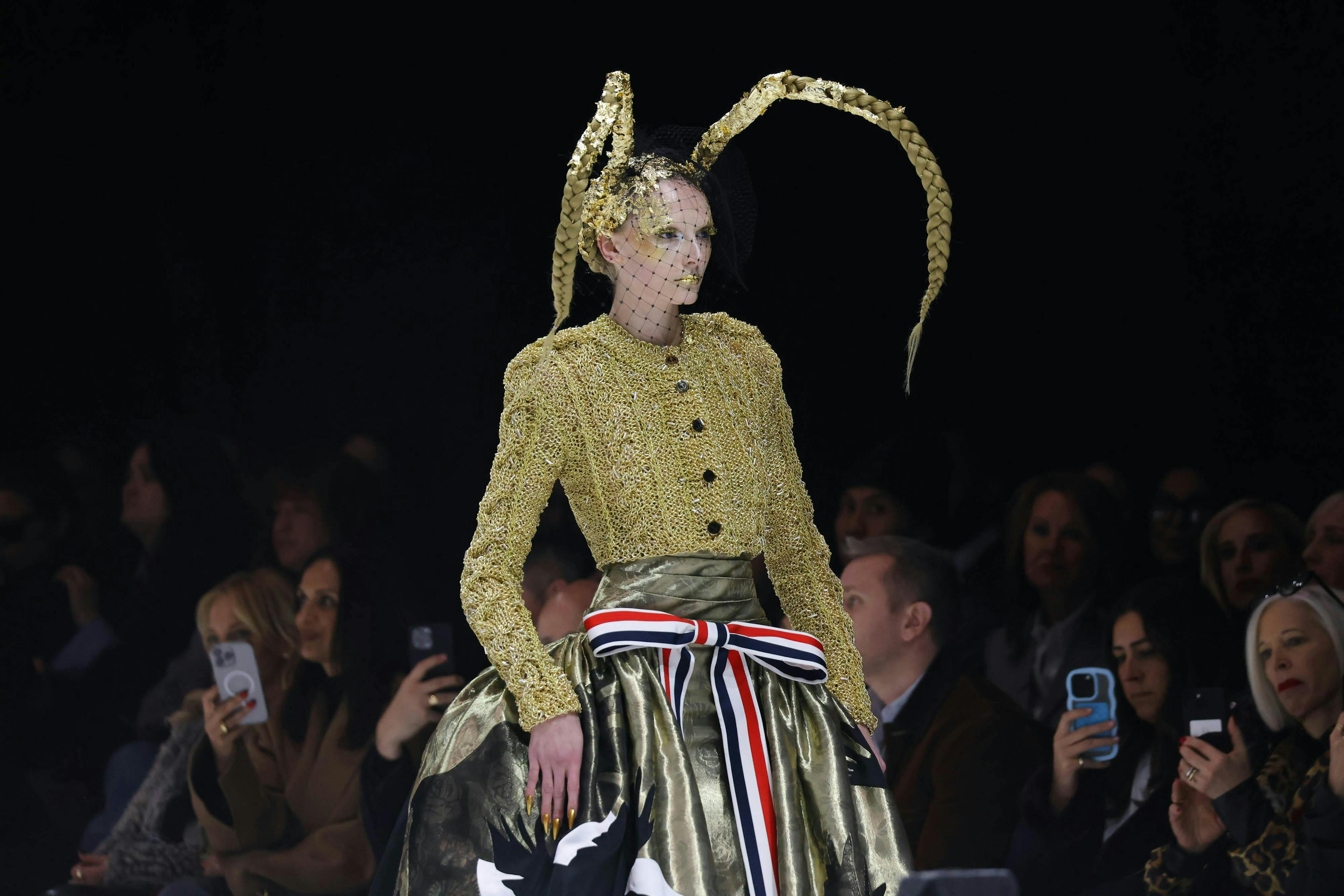 Alex Consani walking Thom Browne Fall 2024. Getty Images.